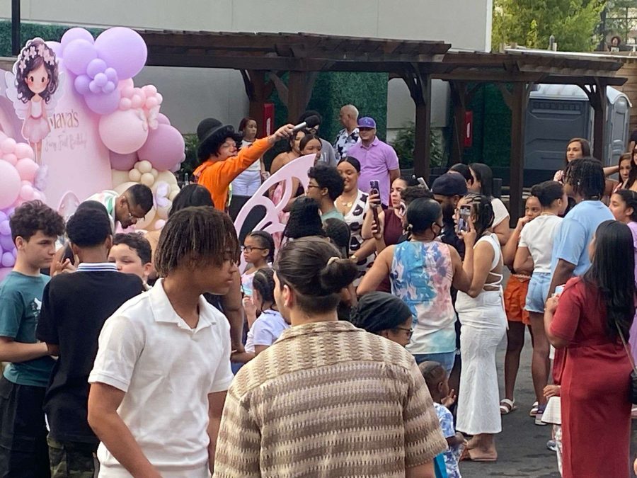 Hosting an outdoor kid's birthday party with several parents and children at and event at The Outer Space in The Bronx, NY